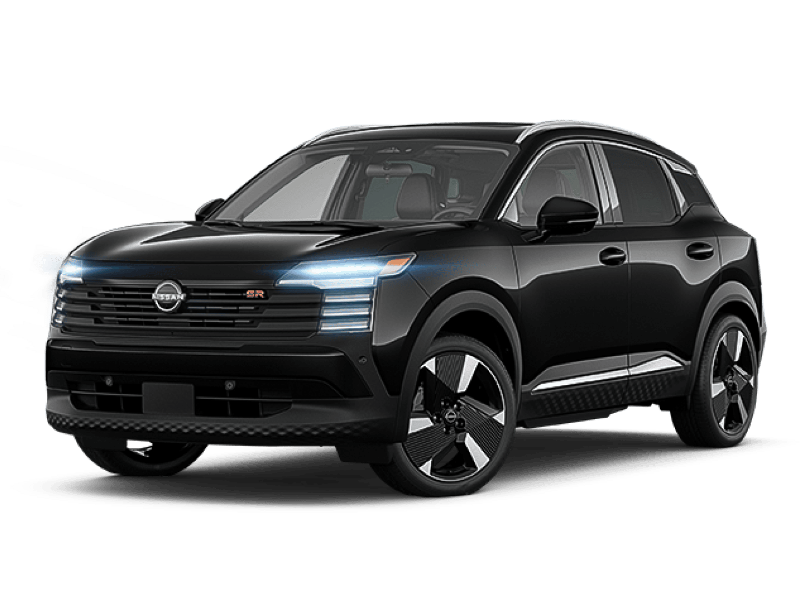 A Black 2025 Nissan Kicks with headlights on