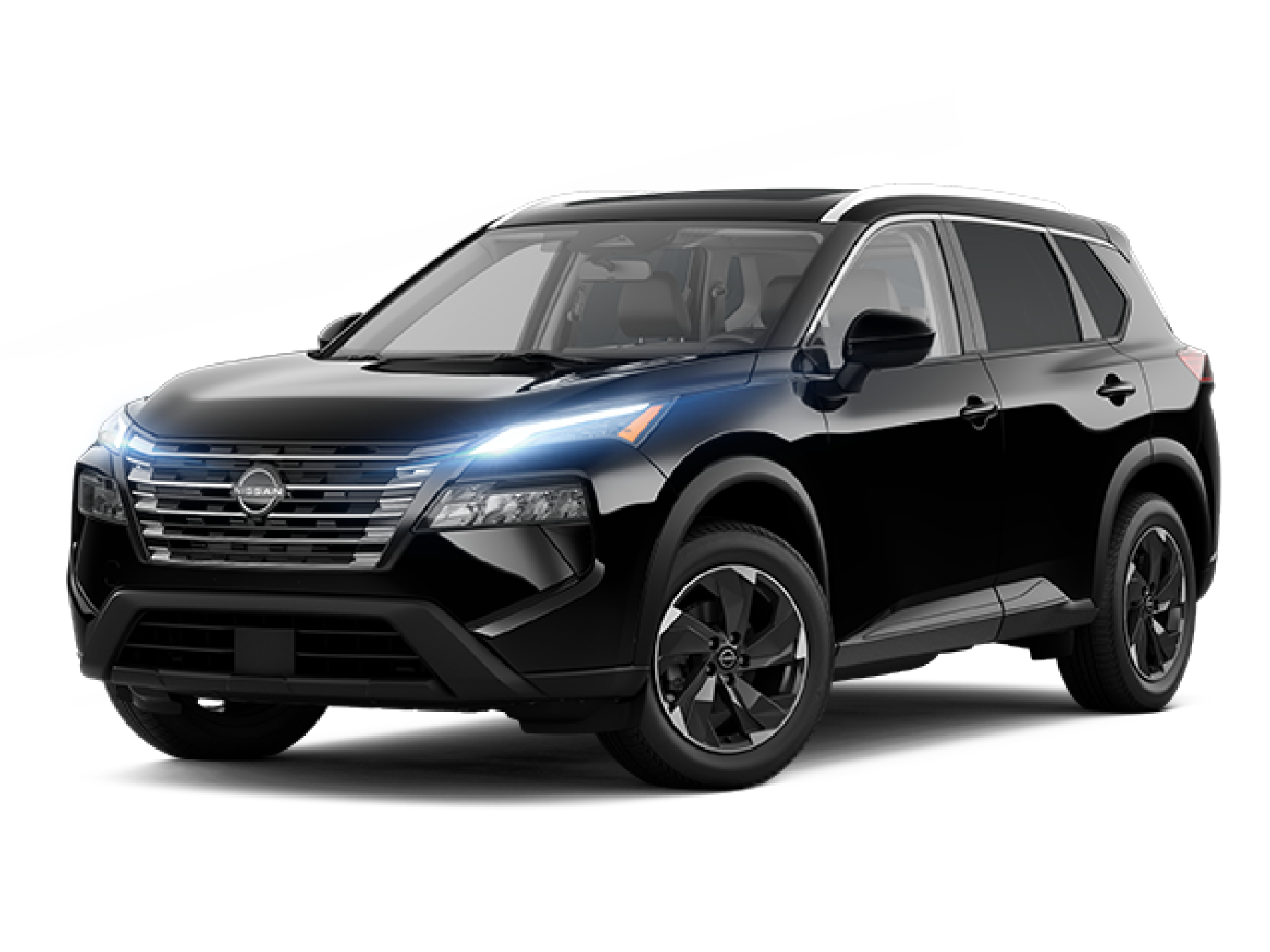 A Black 2025 Nissan Rogue with headlights on